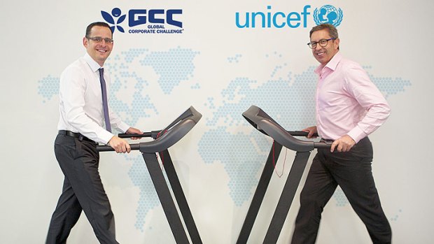 Global Corporate Challenge CEO Tom Sermon (left) and UNICEF Australia CEO Norman Gilliespie have a "walking meeting" to discuss their new partnership.
