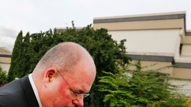 Walter Kohl walks outside his late father, Chancellor Helmut Kohl's house in Oggersheim, Germany on Friday.