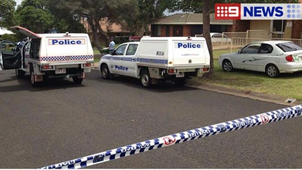 Police officers are at the crime scene in Toowoomba.