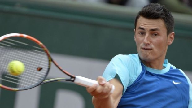 Channel crossing: Bernard Tomic is happy to leave Paris for British grass. 