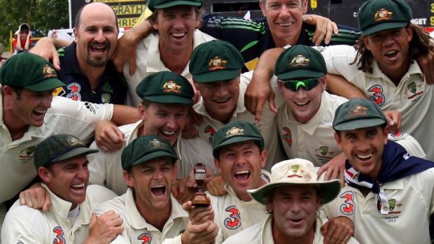 When they were kings: John Buchanan (in the back row) celebrates with the Australian team after reclaiming the Ashes in 2006.