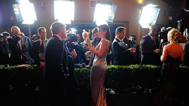 Oscar winner Sandra Bullock speaks to the world's press after her 2010 victory.