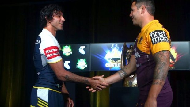 Queensland derby: Thurston and Broncos counterpart Corey Parker  shake hands on Monday ahead of their final on Saturday.