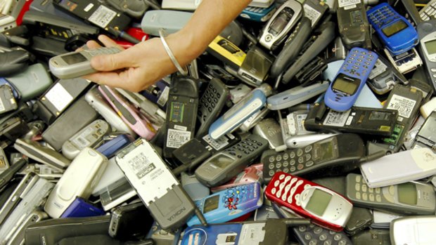 Old mobile phones gathered for recycling under the Mobile Muster recycling program.
