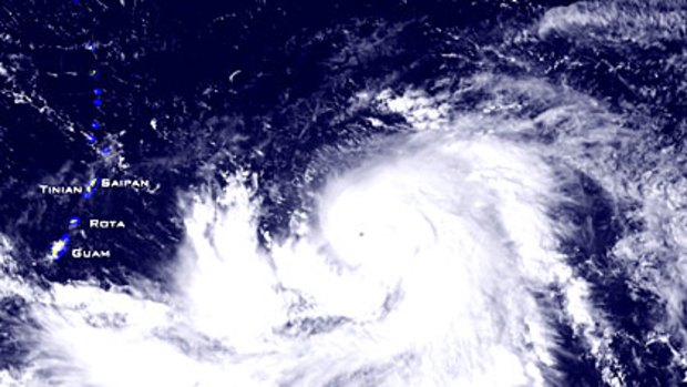 A National Oceanic and Atmospheric Administration photo shows Typhoon Melor bearing down on Guam and Rota.
