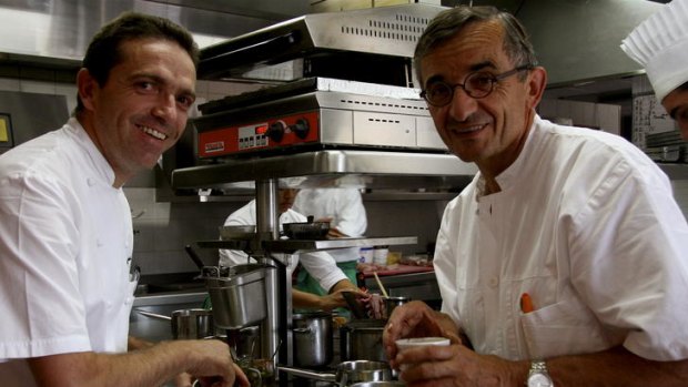 Father to son... French chef Michel Bras, right, in the kitchen with son Sebastien.