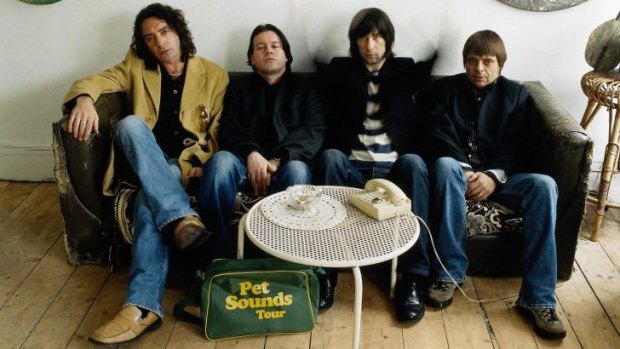 Primal Scream and Robert 'Throb' Young, left.