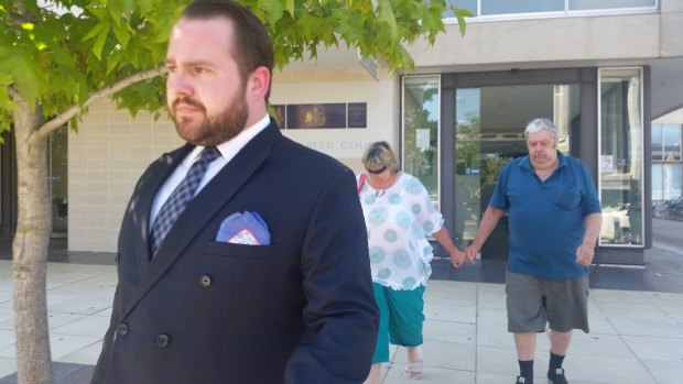 Una Masters, 61, leaves the ACT Magistrates Court on Wednesday with a supporter, right, and lawyer Peter Woodhouse.