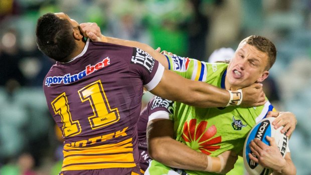 Jack Wighton tries to fend off Brisbane's Alex Glenn.