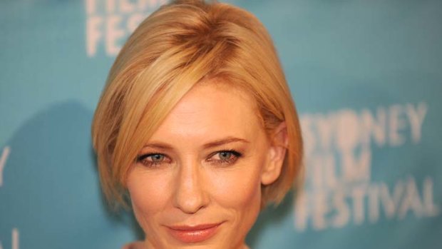 Serene last night, but an icy-eyed, orange-haired intelligence operative on screen ... Cate Blanchett.