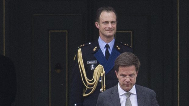 The Dutch Prime Minister, Mark Rutte, leaves the royal palace Huis ten Bosch after handing in his resignation to Queen Beatrix in The Hague.