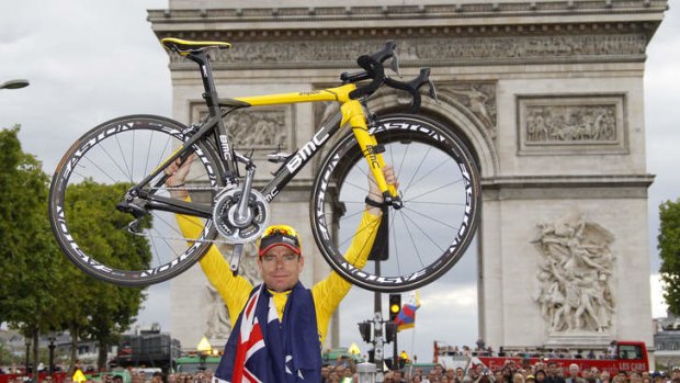 Cadel Evans in front the Arc de Triomphe as he celebrates winning the Tour de France in 2011.