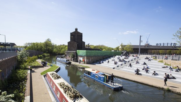 Canal cruise: A barge passes Granary Square steps in King's Cross.