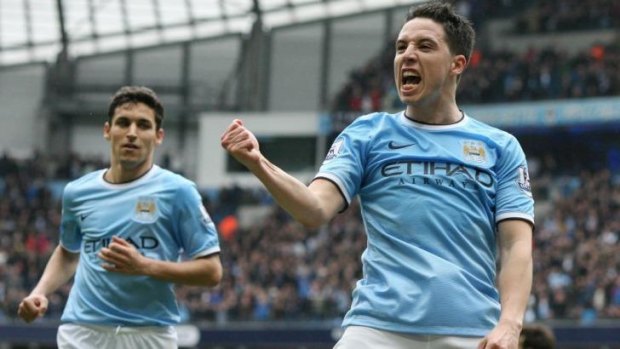 In the money: Manchester City's players are the world's highest paid. 