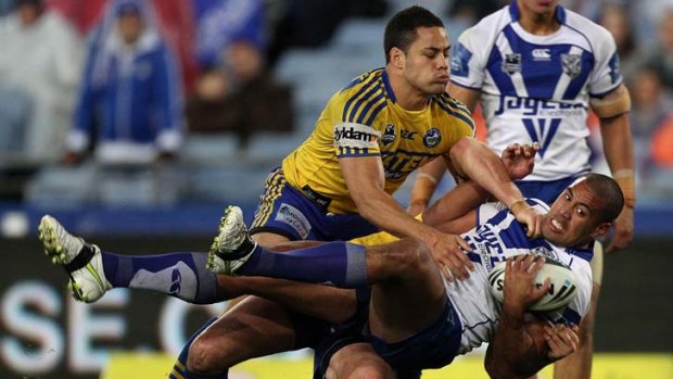 The bigger they are &#8230; Parramatta's Jarryd Hayne lays one of the night's biggest hits on Canterbury’s Frank Pritchard in the tight one-point tussle between the two rival clubs. Hayne scored the only Eels try.