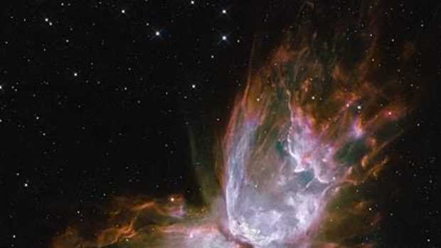 A butterfly emerges from as a star dies in Planetary Nebula NGC 6302.