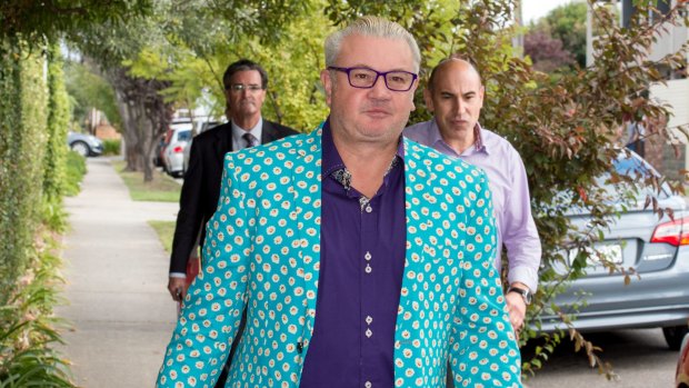 Geelong's mayor Darryn Lyons prepares to speak with media outside his home in Geelong.