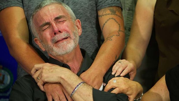 Public show of emotion: Brian Bradbury cries as he appeals for information into the killing of his wife Lynette.