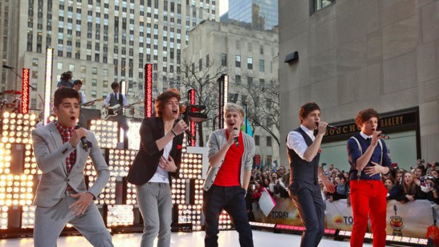 British-Irish boy band One Direction performing.