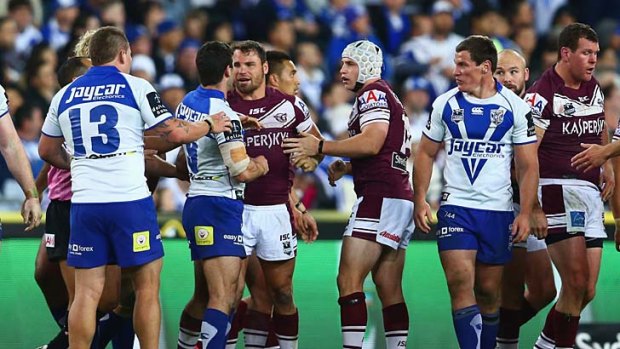 Fight night ... Sea Eagles second-rower Anthony Watmough squares up to Bulldogs hooker Michael Ennis in last Friday's fiery first qualifying final at ANZ stadium.