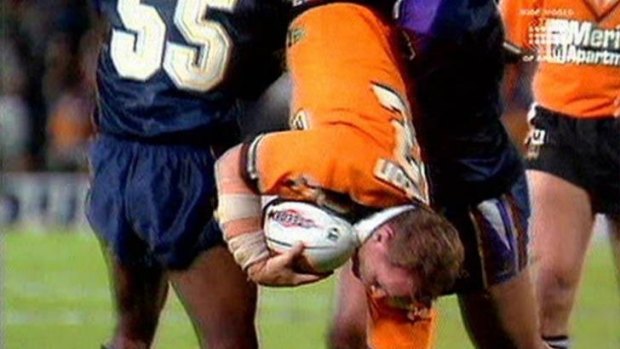 Career-ender: Jarrod McCracken's career was ended by this spear tackle by Melbourne Storm players Stephen Kearney and Marcus Bai in 2005.  