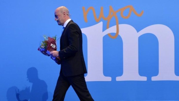Sweden's Prime Minister Fredrik Reinfeldt walks off the stage after speaking during the election night party of the Moderate Party, in Stockholm.