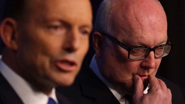 Prime Minister Tony Abbott with Attorney-General Senator George Brandis on Tuesday.