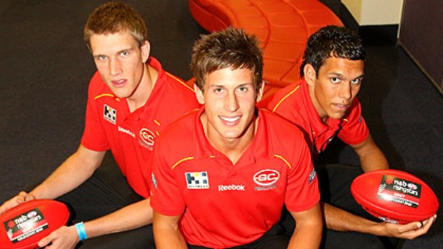 Gold Coast Suns new recruits (from left) Sam Day, David Swallow and Harley Bennell.