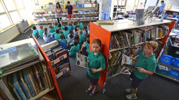Montmorency South primary school students are taking lessons in the library while they wait for two portable classrooms.