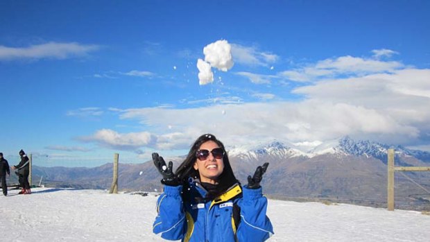 The writer enjoys snow for the first time at Coronet Peak.