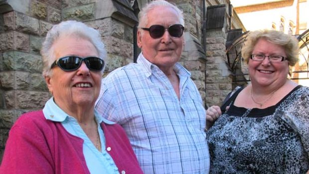 Karen Mulcahy (right) from Brisbane at St Stephen's Cathedral with parents Del and Ben Mulcahy who have travelled from Lismore.