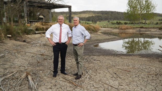 Prime Minister Scott Morrison and Deputy Prime Minister Michael McCormack investigate the drought in Mulloon in October. 