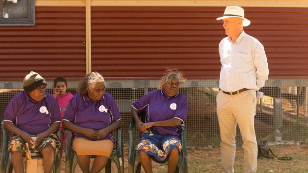 Warren Snowdon talks to local women in the NT community of Lajamanu.