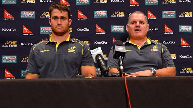 Wallabies captain James Horwill  and coach Ewen McKenzie address the media in Sydney on Monday.