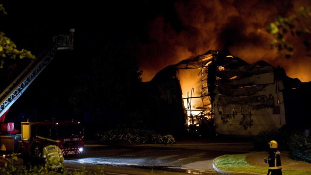 Firefighters battle a massive blaze at the Sony distribution centre in Enfield north of London.