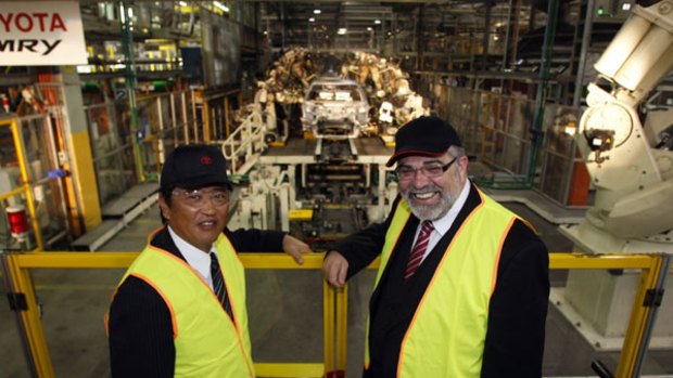 Toyota Australia president Max Yasuda (left) and Industry Minister Kim Carr.