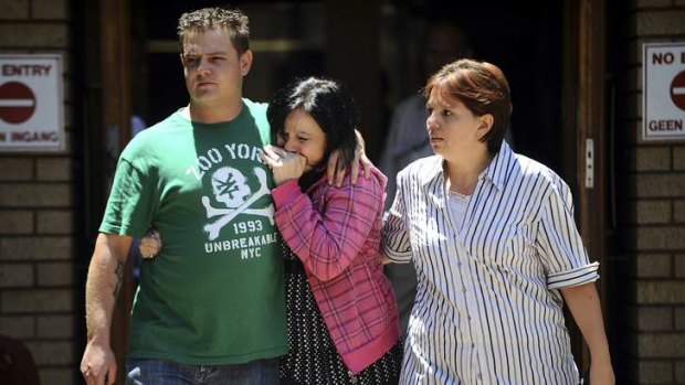 Emotional family members leave the courthouse after members of the right-wing "Boeremag" were sentenced at Pretoria High Court over a plot to assassinate Nelson Mandela.