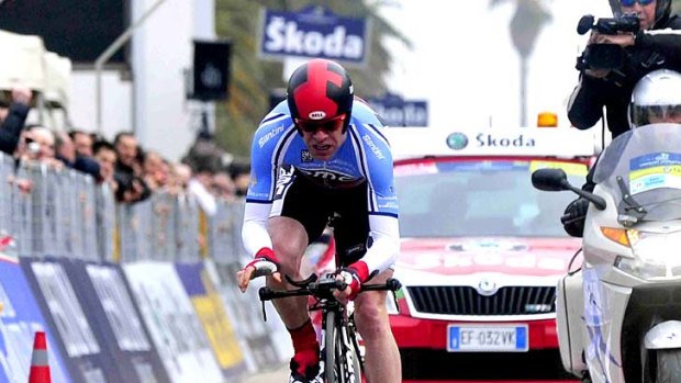 Cadel Evans crosses the finish line during the individual time trial stage on his way to winning the Tirreno-Adriatico  race.
