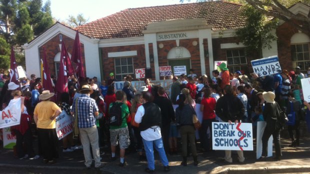 About 200 people gather at Bowen Hills close to Sunday's LNP 2013 Convention to protest the closure of eight schools in southeast Queensland.