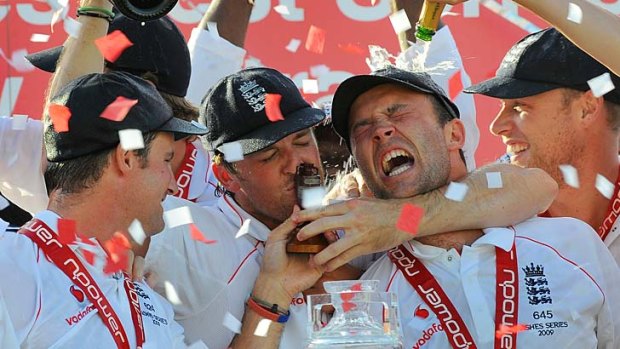 Graeme Swann (second from the left) kisses the Ashes trophy as captain Andrew Strauss (left), Jonathan Trott (second from the right) and Andrew Flintoff (right) enjoy 2009 Ashes success. All are now out of the England fold.