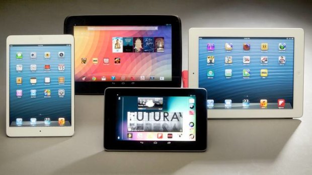 The white-framed iPad mini (left) and standard iPad (far right), with the Samsung Nexus 10 (centre, top) and Asus Nexus 7.