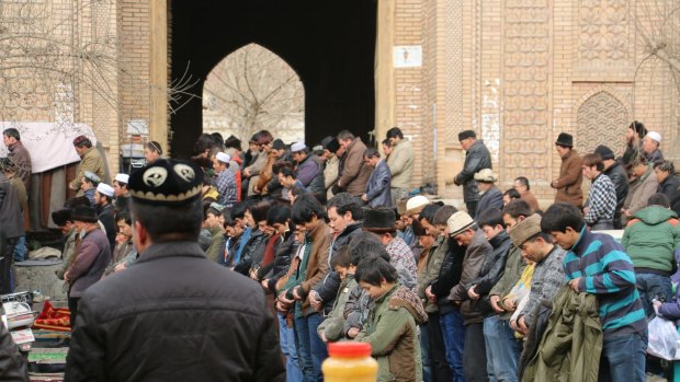 Uighur minority: Worshippers at Friday prayer, at the central mosque in Hotan, in Xinjiang.