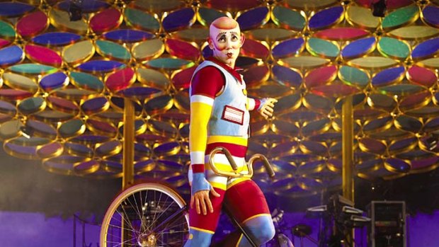 Cirque du Soleil performer puts a bicycle through its paces.