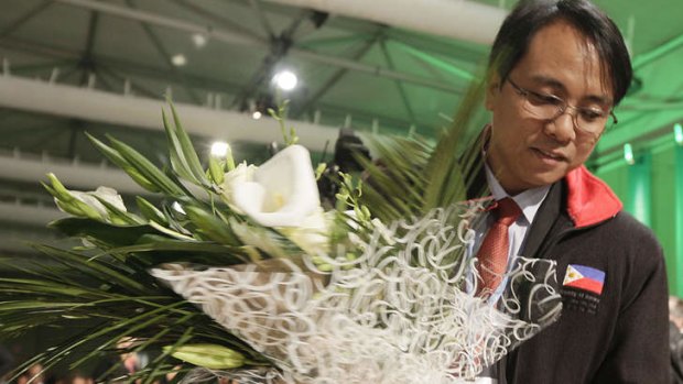 Condolences for a nation: Philippines negotiator Naderev Sano at the United Nations Climate Change Conference in Warsaw.