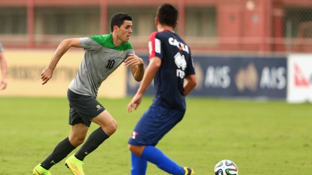 His last bow: Tom Rogic in action during a practice match on Monday. A day later he was cut from the squad.