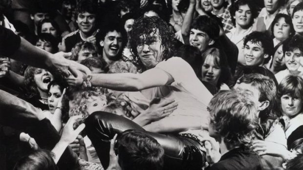 Jimmy Barnes crowd-surfing at Cold Chisel's Last Stand concert at the Entertainment Centre in 1983.