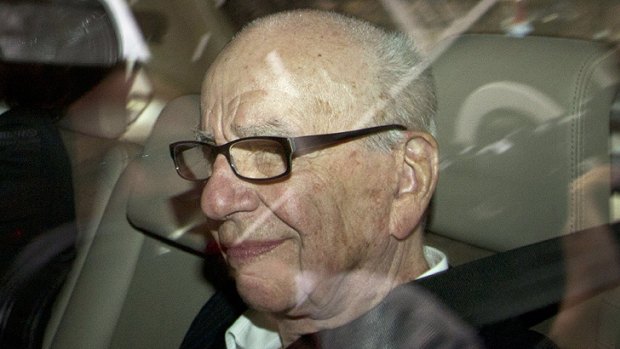 Rupert Murdoch arrives at his residence in central London on July 13.