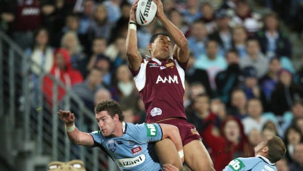 Israel Folau soars for a high ball in a State of Origin match.