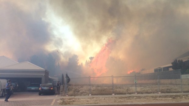 The fires take hold in Ellenbrook after an emergency warning was issued