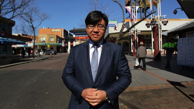 Tim Soutphommasane near the Freedom Gate in Cabramatta, a suburb he has seen throw off negative racial stereotypes